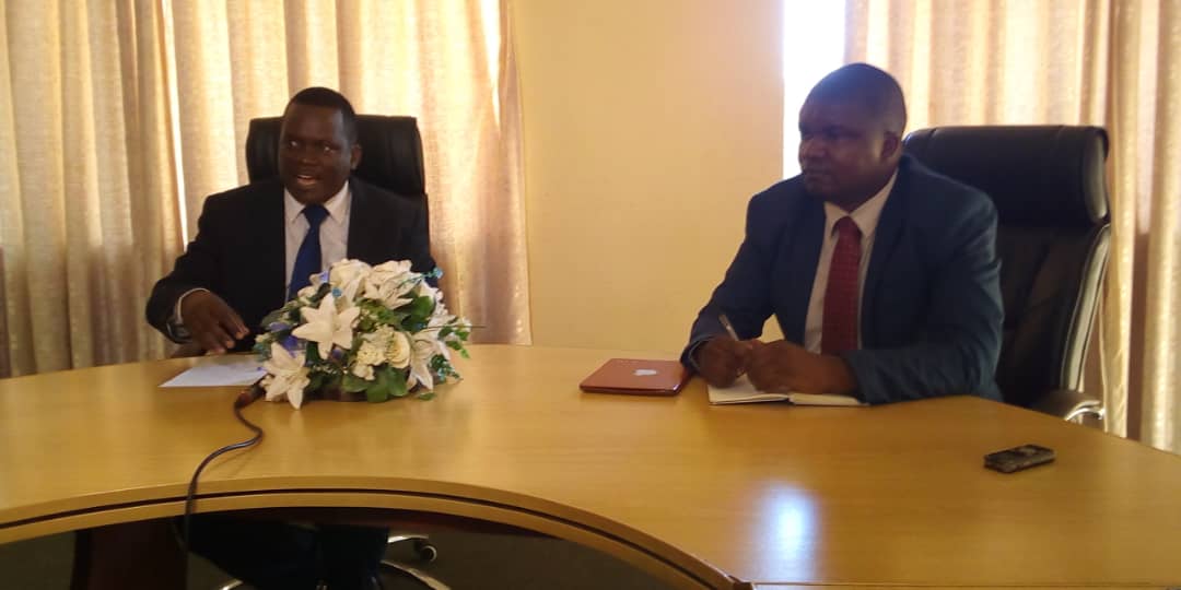 National Coordinator, Dr Teddie Oliver Nakhumwa (l) addressing a news conference