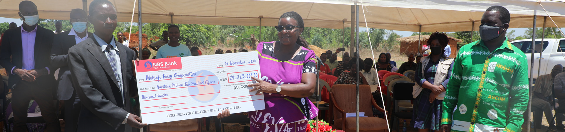 Symbolic cheque presentation to Mchinji Dairy Cooperative by Principal Secretary of Agriculture 